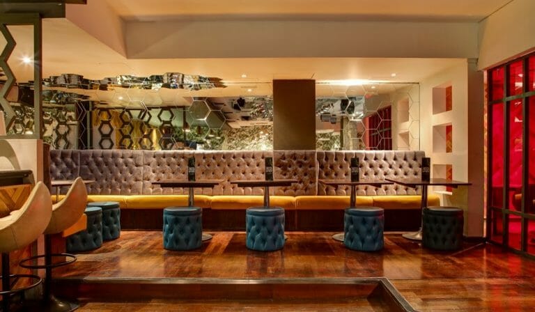 Trendy Cocktail Bar with Themed Rooms image 5