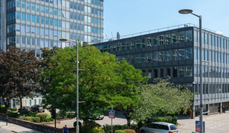 Large 1960’s Office Building with On-Site Car Parking image 1